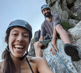 Couple taking a selfie while rock climbing
