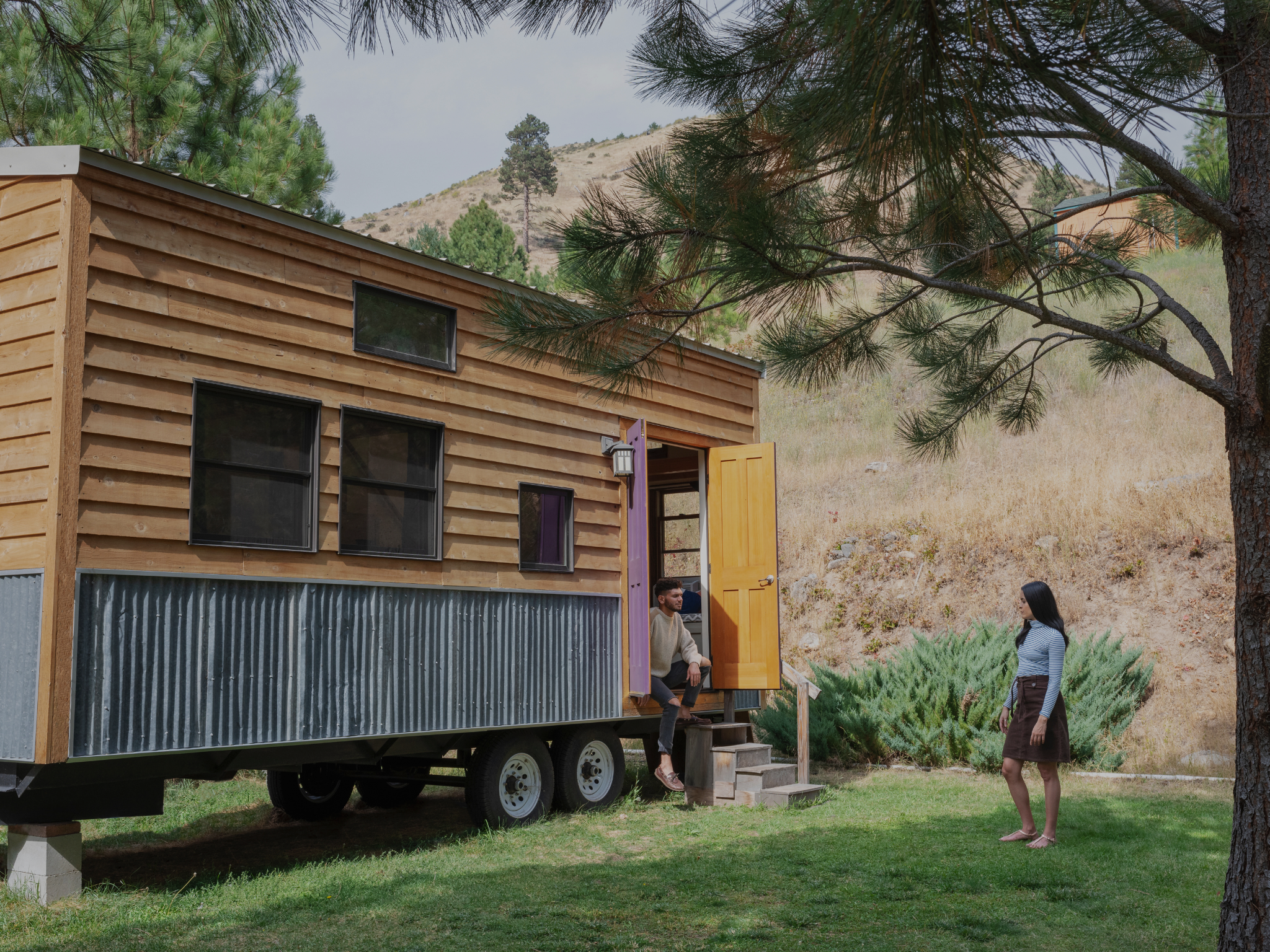 Travel therapist couple at their new tiny home