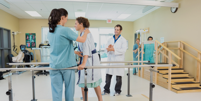 Travel Physical Therapist Assistant working with a patient