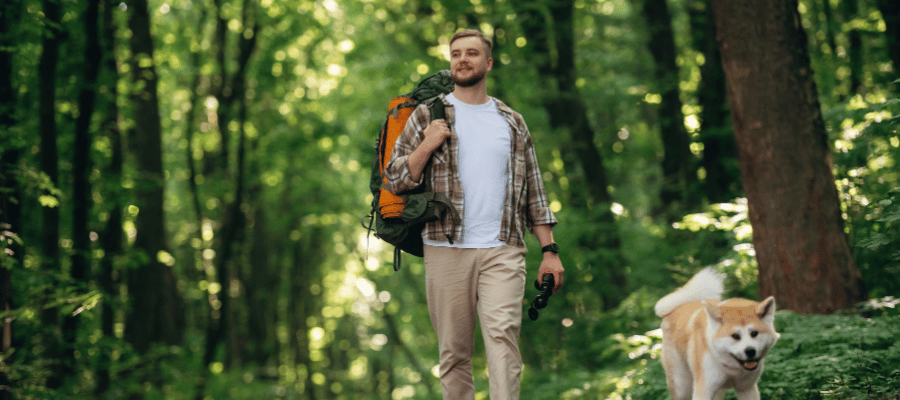 Travel therapist on hike with dog