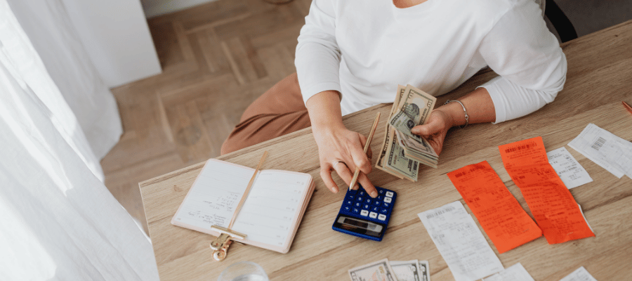 Travel therapist working on budget