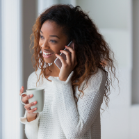 Traveling therapist on phone with recruiter