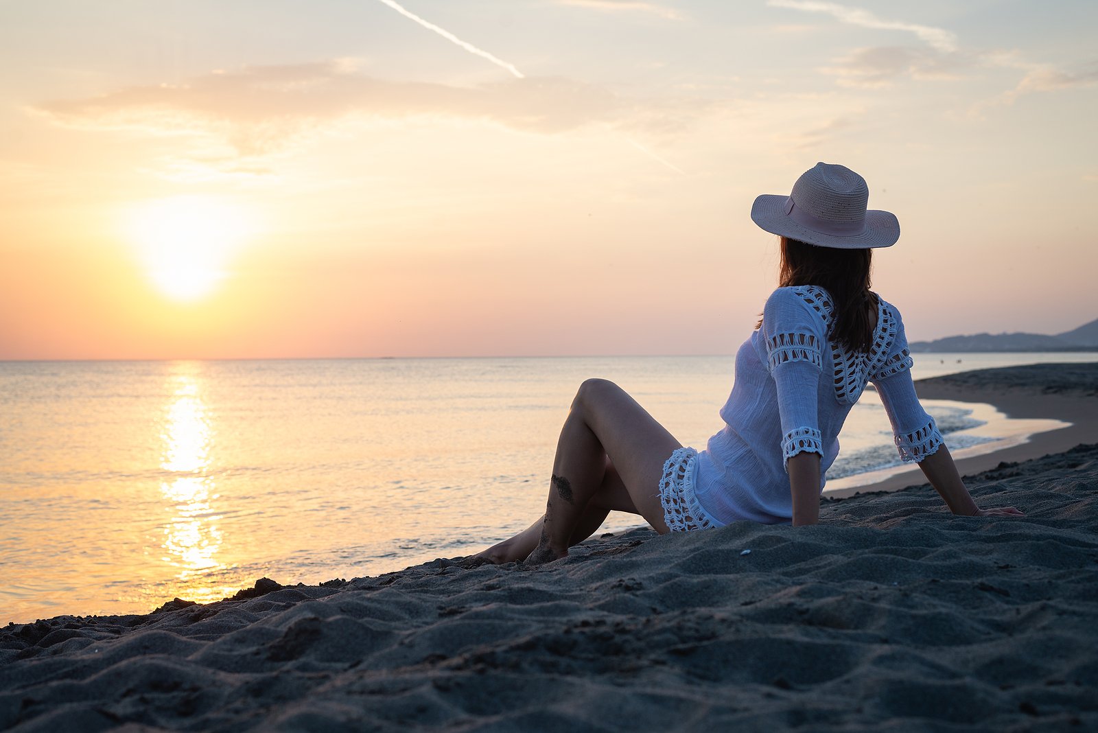 bigstock-Traveler-Girl-In-Sunset-On-Tro-391698989 (1)