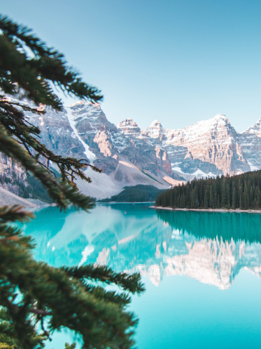 Lake with a mountain range behind it