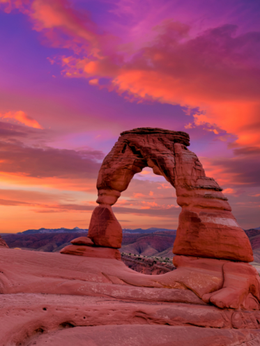 Red rock sculpture with sunset